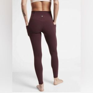 Athleta salutation stash pocket ii tight